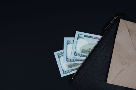 Background concept on the topic of business, financials, corruption, bribes. Top view close up. Dark...