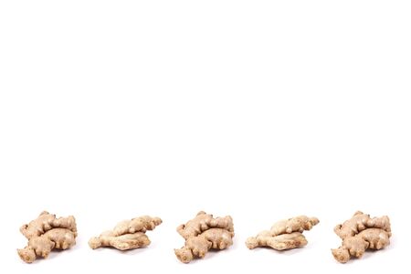 top view on ginger root pattern. Isolated on a white background. Seasoning in the kitchen.の写真素材