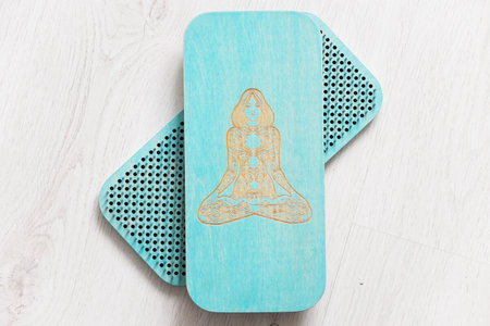 Blue sadhu board made of wood with nails. A man stands on nails. View from above.の写真素材