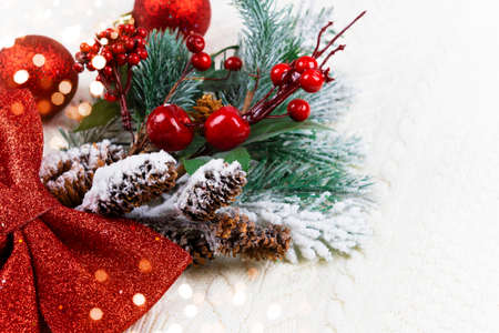 Copy space Festive Christmas, New Year background for congratulations and wishes Merry Christmas. Knitted braids white background. Family traditions. Spruce New Year's bouquet.の写真素材