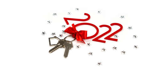 New Year and Christmas background 2022 with keys and with a red bow. Keychain house with keys on an...