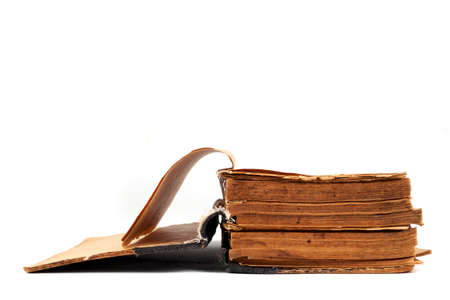 Opening of the Old Ancient Big Book. Old book on an isolated white background. Open book. The concept of the history of typography. Antiques.の写真素材