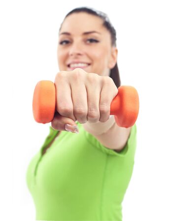 Young beautiful woman during fitness time and exercisingの写真素材