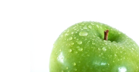 Green apple, isolated on white - close upの写真素材