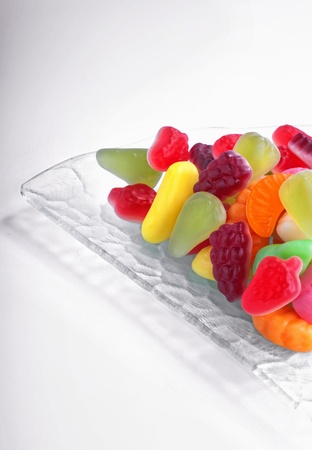 Heap diverse bonbons, isolated on whiteの写真素材