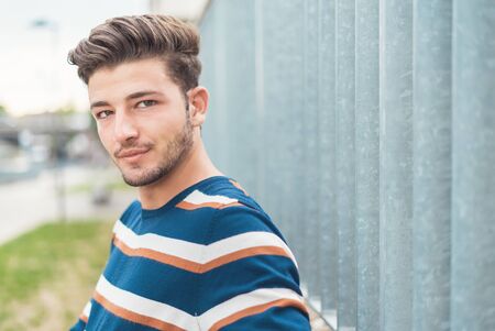 Handsome young caucasian man, closeup of beautiful guyの写真素材