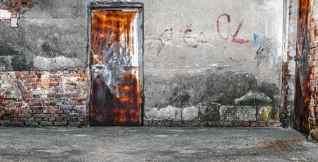 Old cracked or grungy room - basement at background. Ruined blank floor with door. Copy spaceの写真素材