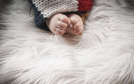 Baby feet with copyspace for text, sweet body part of child, close upの写真素材