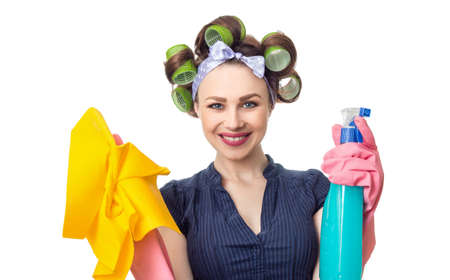 Woman with rag or wipe and cleaning spray for window. Close up of housewife, isolated on whiteの写真素材