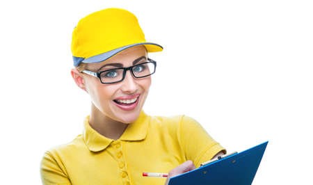 Friendly young woman postman or inspector holding pen and sheet, isolated on white backgroundの写真素材