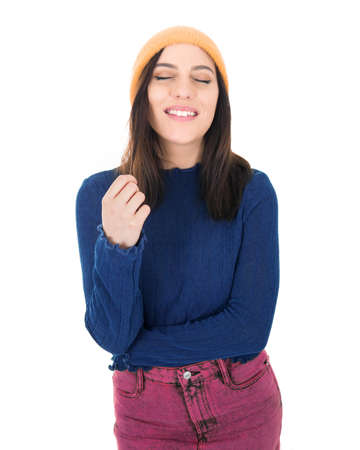 Playful smiling young happy woman, isolated on white background. Attractive girl posing. Studio shotの写真素材