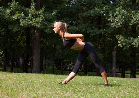 Beautiful woman doing yoga exercises