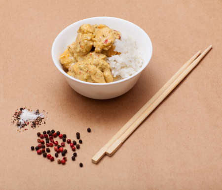 Indian Curry and rice on a paper backgroundの写真素材