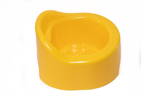 Child yellow toilet isolated on white background. Children's pottyの写真素材