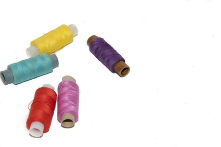 colored thread on white background. items for embroidery. handmadeの写真素材