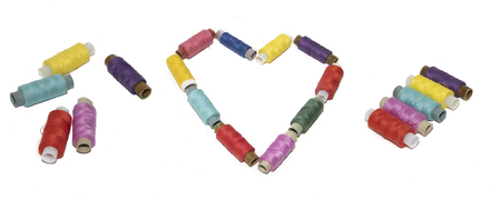 colored thread on white background. items for embroidery. handmadeの写真素材