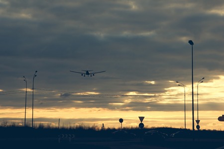 The plane is flying in the sky. Traveling by plane. International transport. Sky and airplane