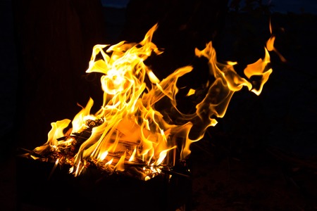A divorced fire in a grill for a shish kebab.