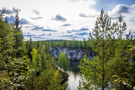 Marble quarry Ruskeala. Invalid marble quarry. Sights of Karelia in Russia. Quarry marble. Pieces and layers of marble.の写真素材