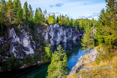 Marble quarry Ruskeala. Invalid marble quarry. Sights of Karelia in Russia. Quarry marble. Pieces and layers of marble.の写真素材