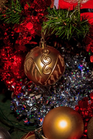 Closeup of bauble from a decorated Christmas tree. Retro filter effect.の写真素材