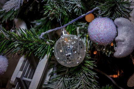 Closeup of bauble from a decorated Christmas tree. Retro filter effect.の写真素材