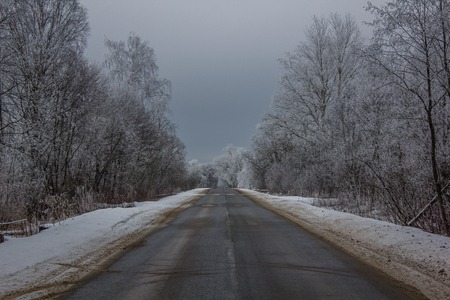 winter snowy road. snow lies near the road. winter pictureの写真素材