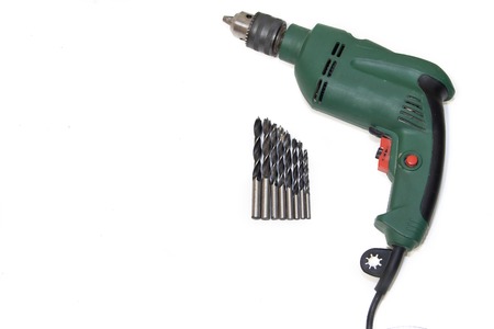 Drill on a white background. Tools on a white background. Isolated objects. Items for repair and collection of furniture.の写真素材