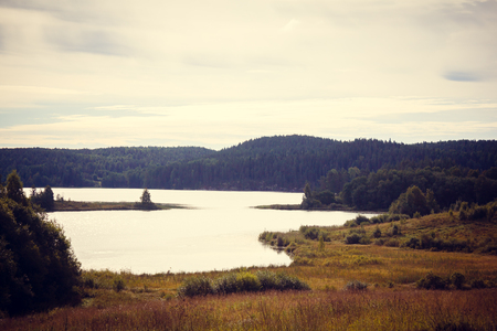 Lake in Karelia. summer natural landscapes in travel. North of Russiaの写真素材