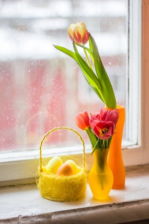 Red tulips in a vase. Postcard to the international women's day. March 8.の写真素材