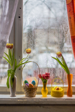 Red tulips in a vase. Postcard to the international women's day. March 8.の写真素材