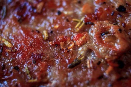 A piece of chicken fillet is fried in vegetable oil in a frying pan. Harmful fried food. Cholesterol. Vegetable oil. Food and Drink. Chicken breast filletの写真素材