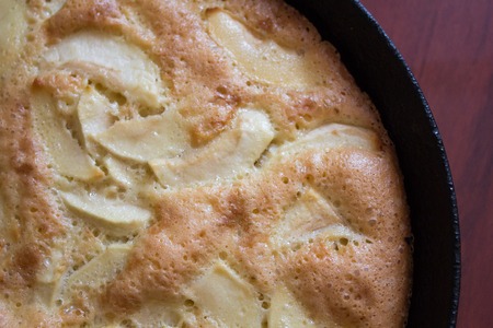 Charlotte pie pan. Apple pie. Homemade baking. Cook at home. Cast-iron pan.