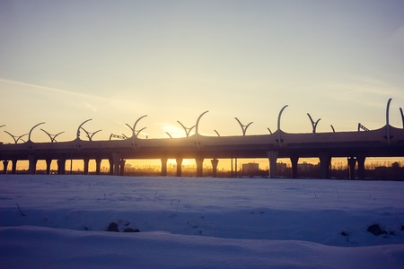 Road at sunset bypass. City expressway. Detour urban traffic jams. Sunset roadの写真素材