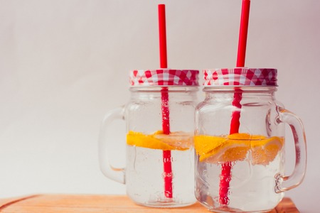 Glasses with homemade lemon lemonade. cold drink. Carbonated drink