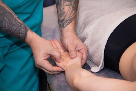 Massage with oil in the spa salon. Classic massage. Relaxing massage. Relax in the spa salon. Gatchina, Leningrad Region, Russia, February 6, 2019のeditorial素材