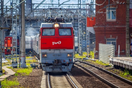 Locomotive goes on rails. Russian train. Russian railway. Locomotive. Russia St. Petersburg August 7 2018のeditorial素材