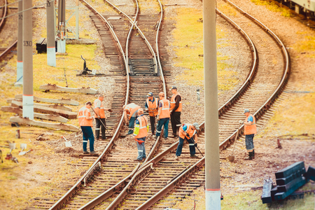 Workers repairing the railway. Railway works Russia, St. Petersburg August 7 2018のeditorial素材