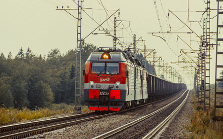 Summer Russian Railway. Locomotive rides on the Russian railway. Railway. Russia, Leningrad region, August 3 2018のeditorial素材