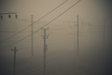 Fog on the railway. Foggy Russian railway. Morning fog. Heavy fogの写真素材
