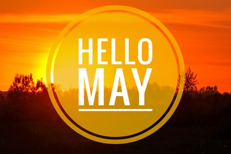 Banner Hello May. Greeting the new month. Hi spring. The text in the picture of the sunset. Evening sunset Sunset. Beautiful skyの写真素材