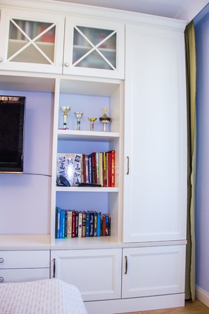 Bright bedroom with a large bed. The interior of the bedroom. The furniture in the bedroom. Russia, St. Petersburg, May 8, 2018のeditorial素材