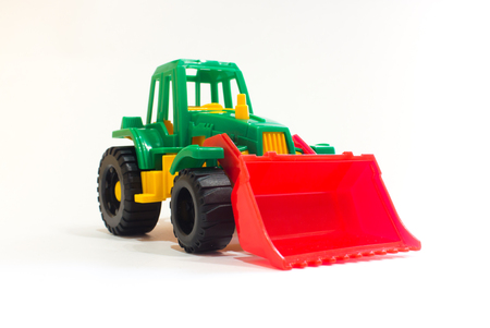 Toy tractor isolated on white background. Children's toy. Isolated objectの写真素材