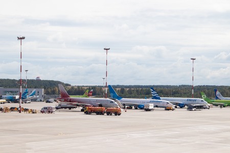 Aircraft at the airport. Aircraft parking. Preparing for the flight. Russia, St. Petersburg, Pulkovo, official spotting on August 15 2018のeditorial素材