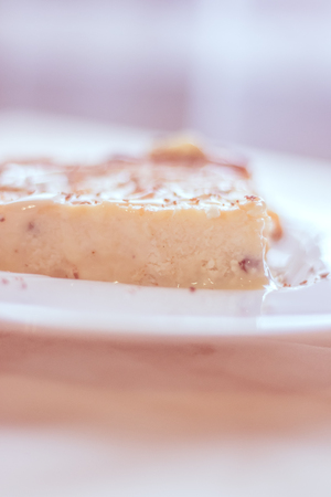 Cottage cheese casserole with condensed milk on a plate. Baking from cottage cheese. Breakfast