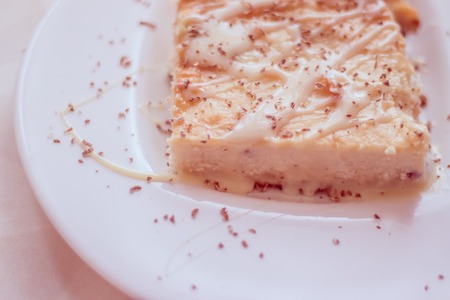 Cottage cheese casserole with condensed milk on a plate. Baking from cottage cheese. Breakfastの写真素材