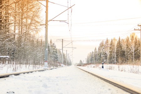 Russian railway in winter. Snow railway. Rails and sleepers. Snow pictureの写真素材