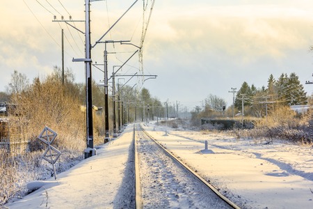 Russian railway in winter. Snow railway. Rails and sleepers. Snow pictureの写真素材