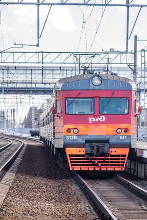 Russian train in the spring. Public transport. Russia Lyuban March 24, 2019のeditorial素材