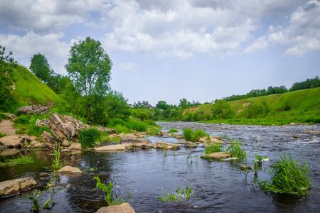 Sablinsky waterfalls. Little waterfall. The brown water of the waterfall. Waterfalls of Russia....